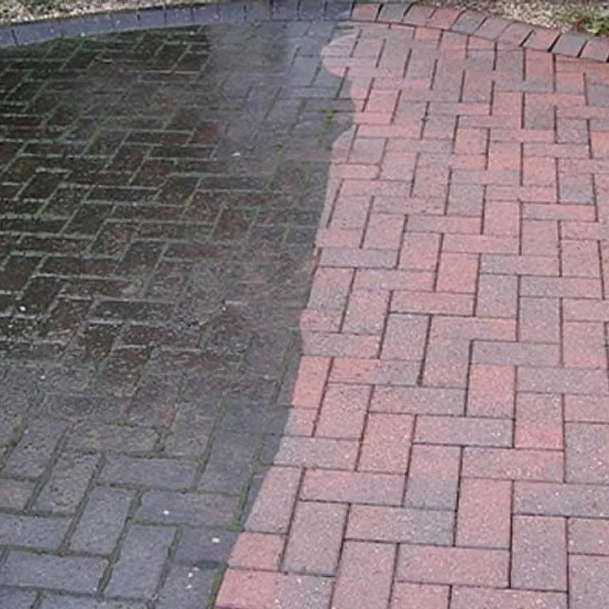 Block paved driveway half cleaned