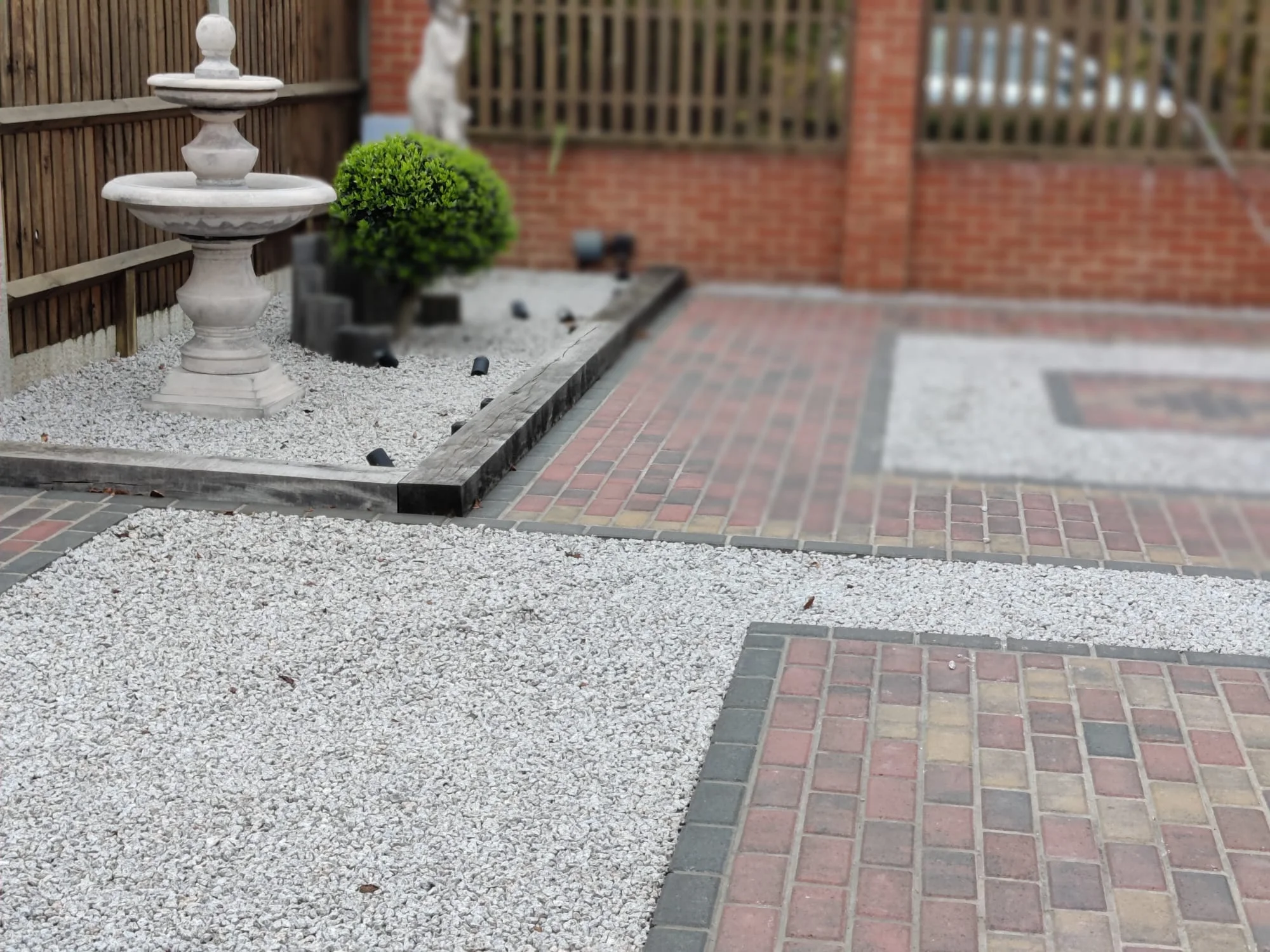 A bespoke block-paved and gravel driveway by JR Landscapes & Driveways