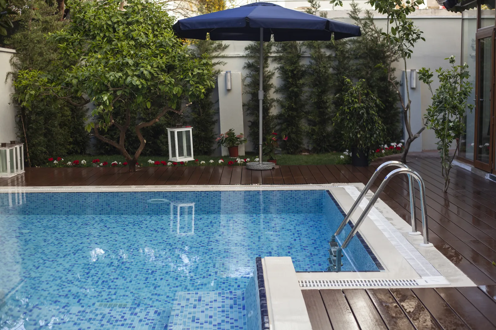 Swimming Pool Surrounds by JR Landscapes & Driveways